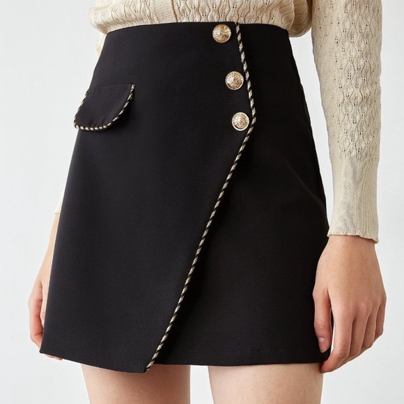 J.ING Dresses & Skirts - J.ing Inaya Black Asymmetrical Mini Skirt with Built-in Shorts and Gold Accents